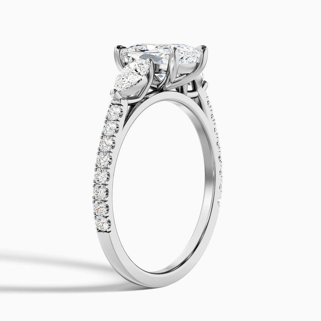 Noorie Three Stone Pave Ring with Pear Side Stones and an Elongated Cushion Lab Grown Diamond