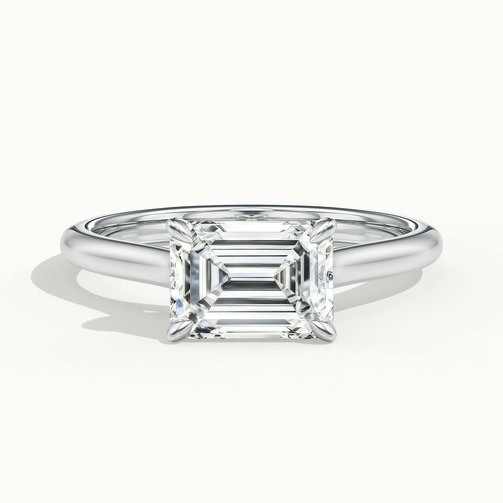 Lucienne East to West Emerald Solitaire Engagement Ring