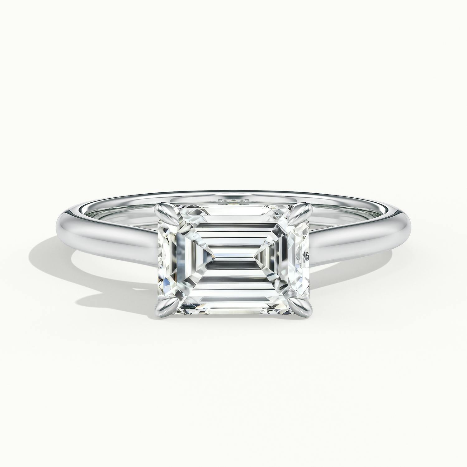 Lucienne East to West Emerald Solitaire Engagement Ring