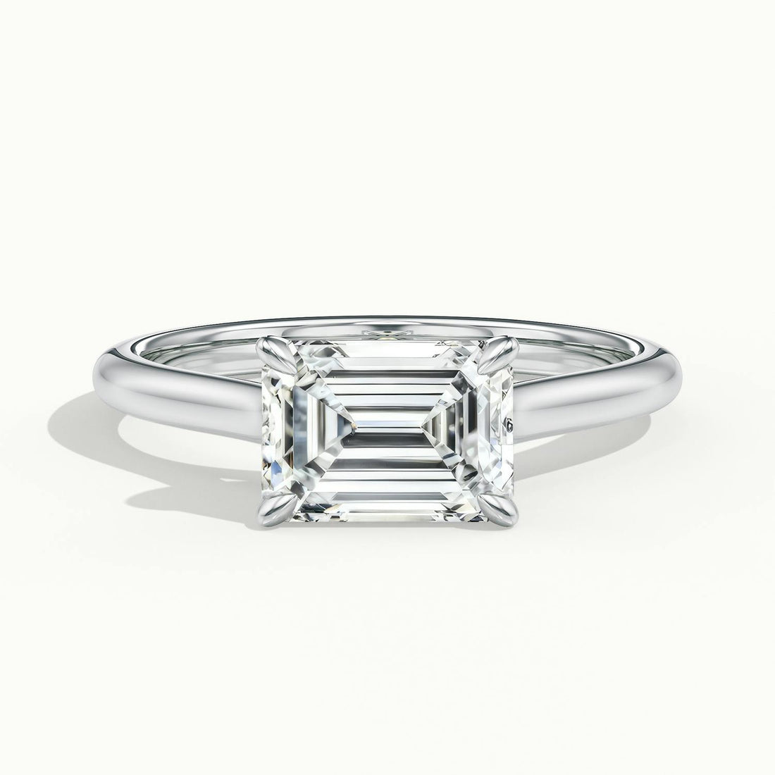 Lucienne East to West Emerald Solitaire Engagement Ring