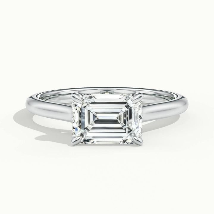 Lucienne East to West Emerald Solitaire Engagement Ring