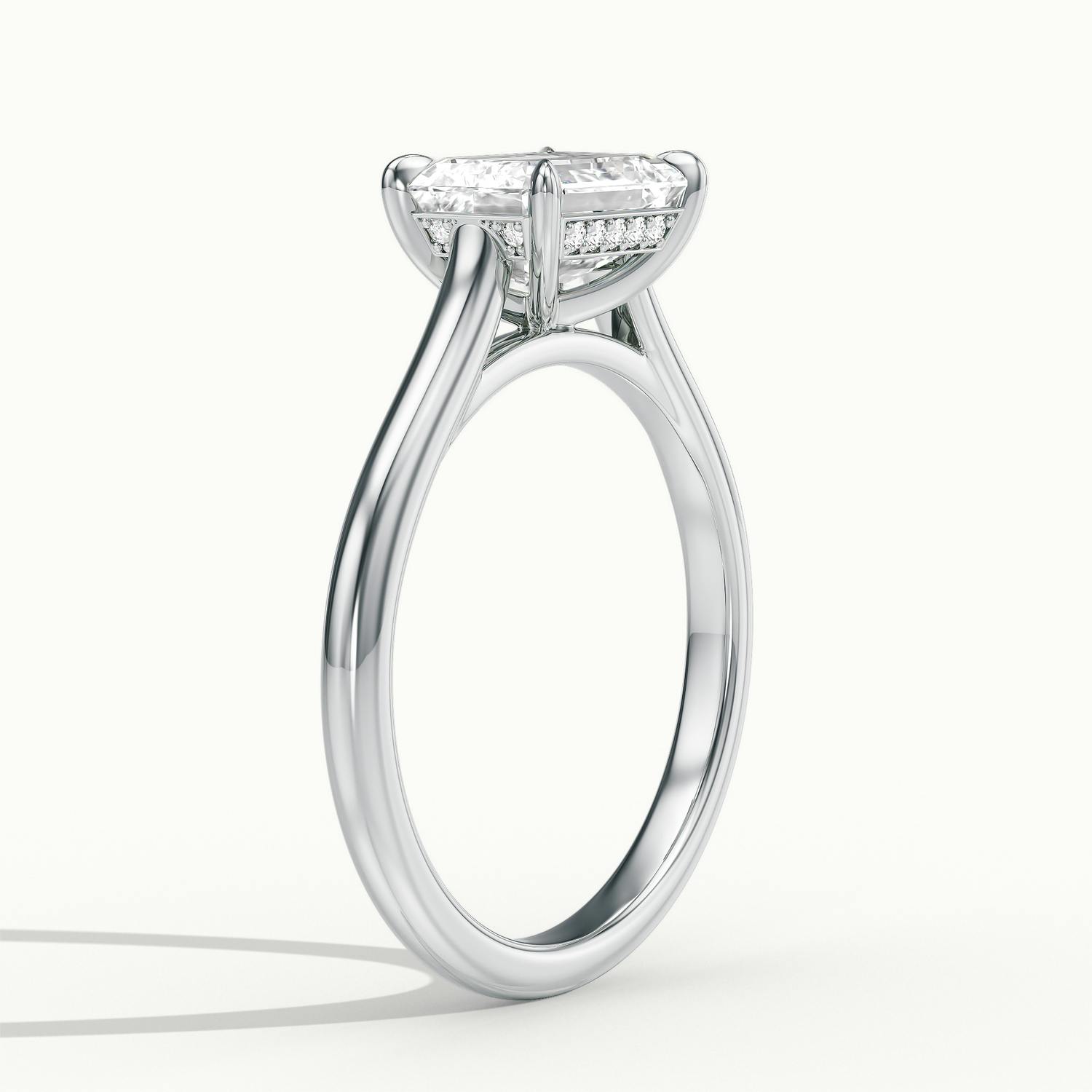 Lucienne East to West Emerald Solitaire Engagement Ring