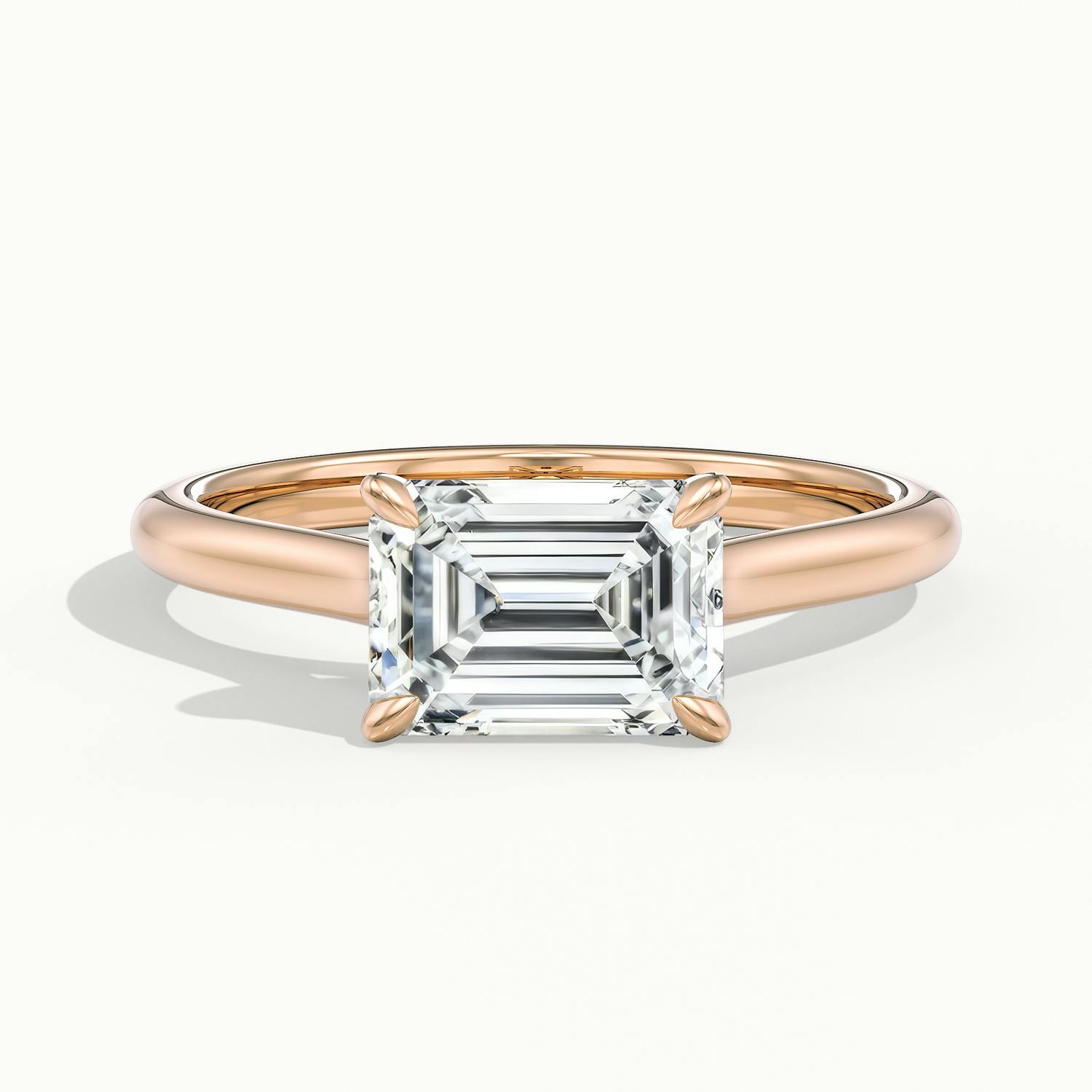 Lucienne East to West Emerald Solitaire Engagement Ring