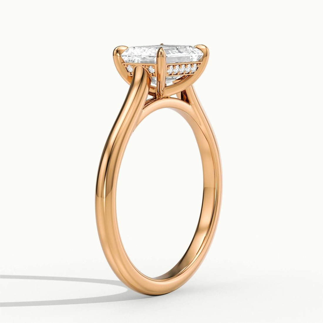 Lucienne East to West Emerald Solitaire Engagement Ring