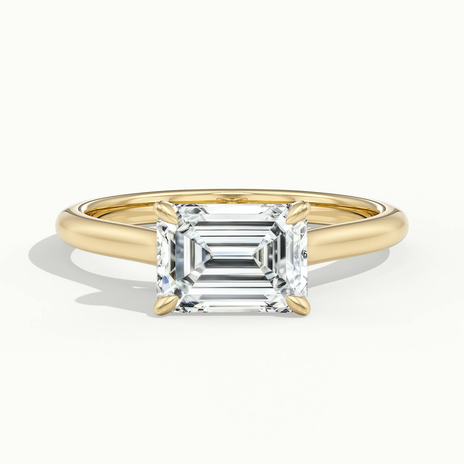 Lucienne East to West Emerald Solitaire Engagement Ring