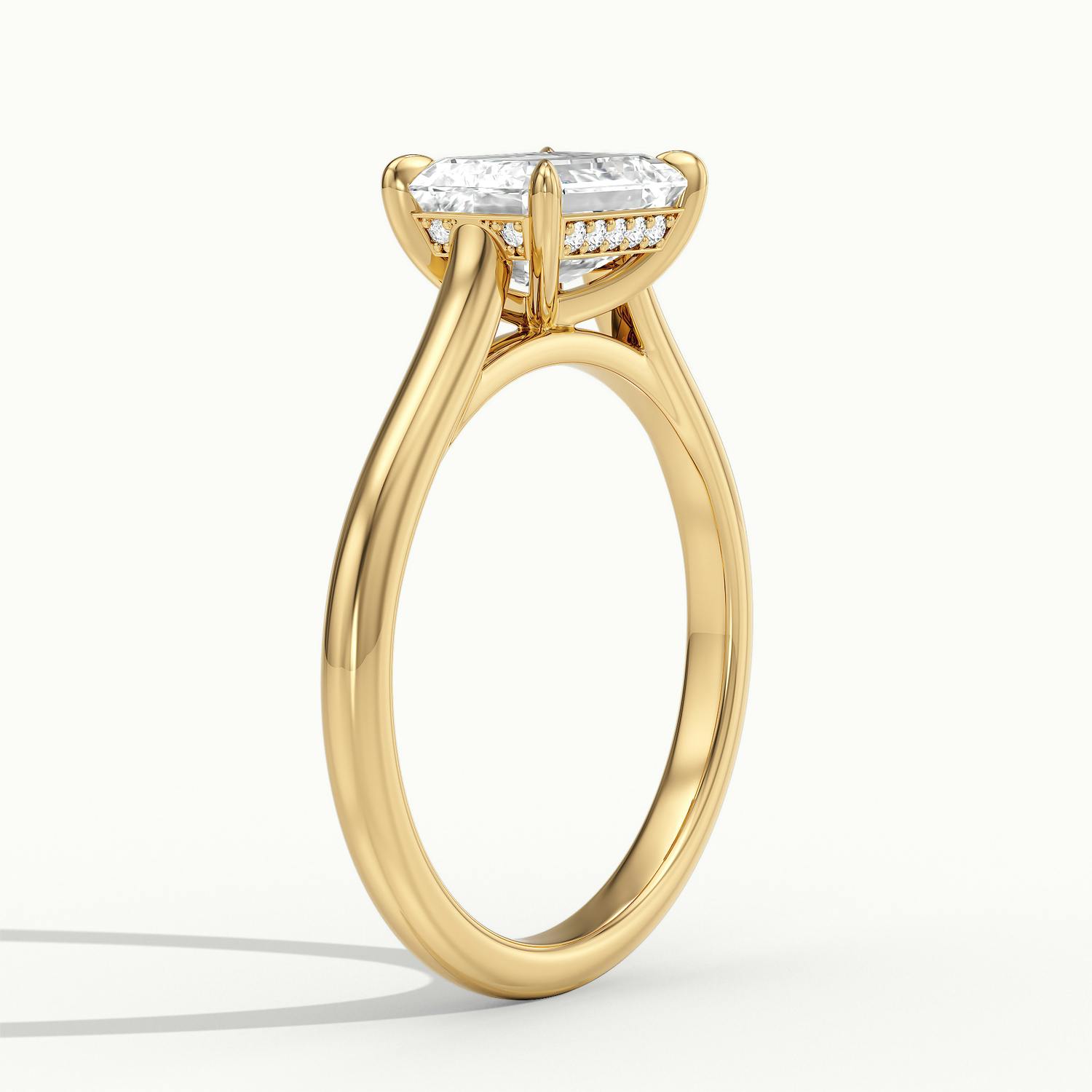 Lucienne East to West Emerald Solitaire Engagement Ring