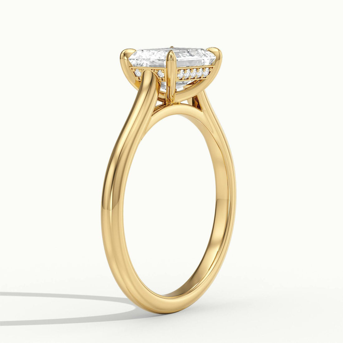 Lucienne East to West Emerald Solitaire Engagement Ring