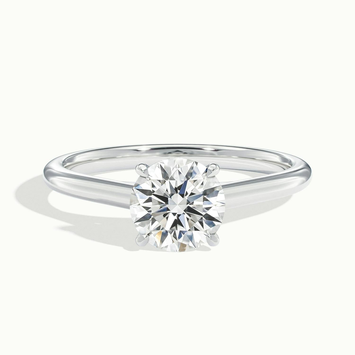 Noelle Round Solitaire Engagement Ring