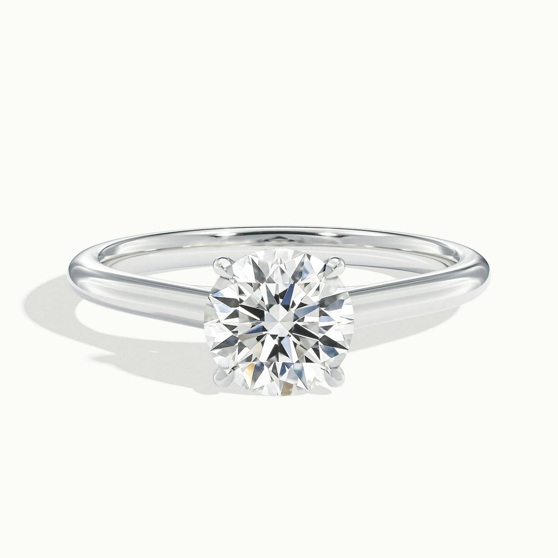 Noelle Round Solitaire Engagement Ring