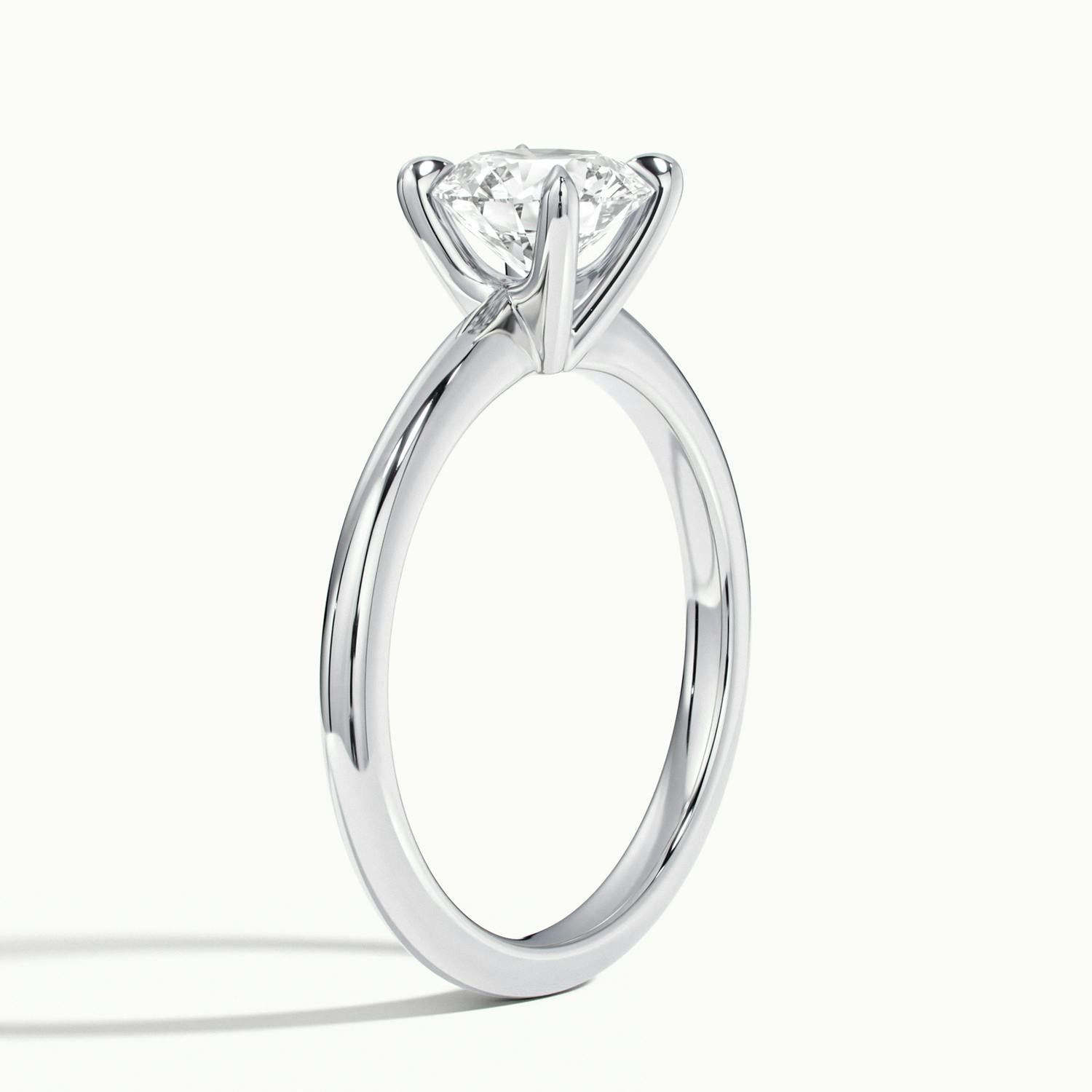 Evelisse Round Solitaire Engagement Ring