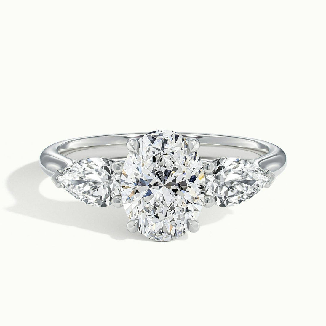 Veyrra Oval Pear Side Stone Engagement Ring