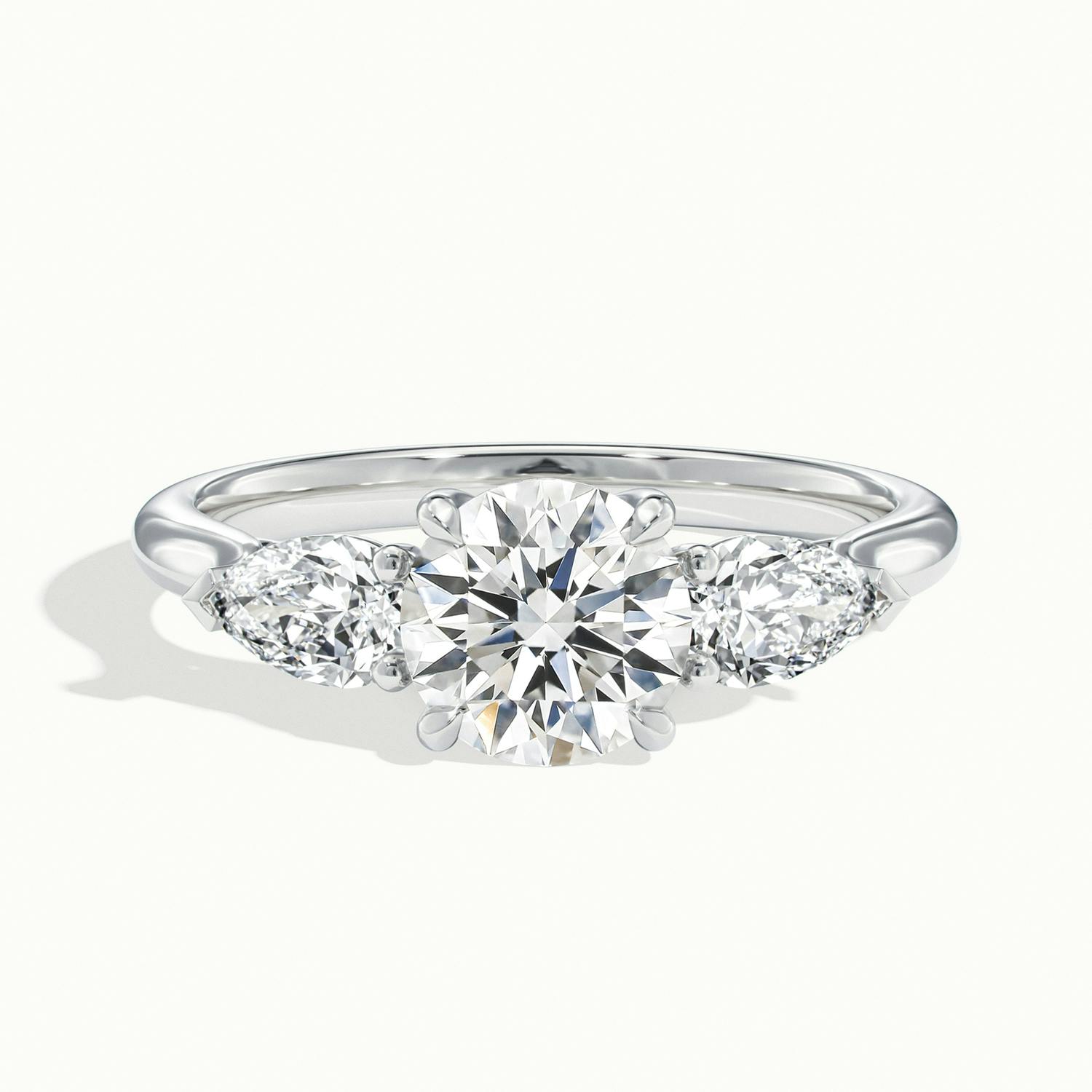 Veyrra Round Pear Side Stone Engagement Ring