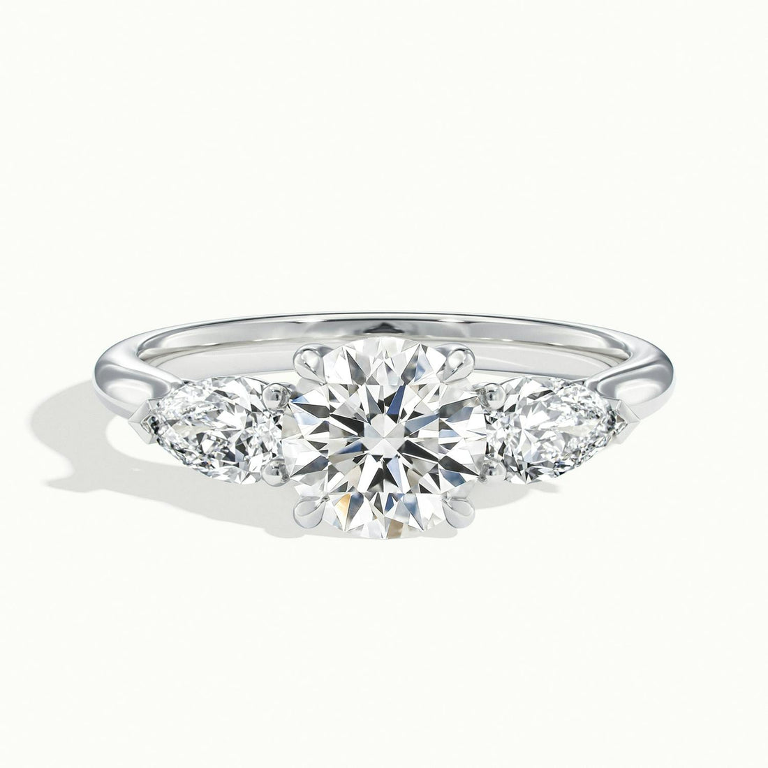 Veyrra Round Pear Side Stone Engagement Ring