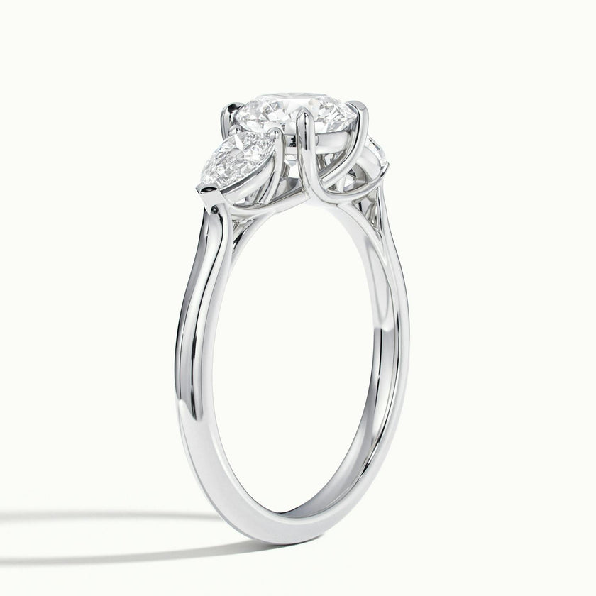 Veyrra Round Pear Side Stone Engagement Ring