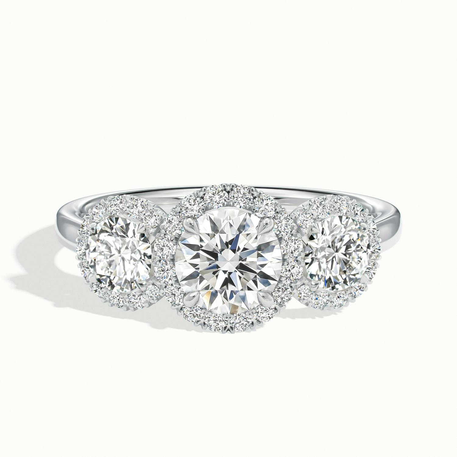 Klaris Round Three Stone Halo Engagement Ring