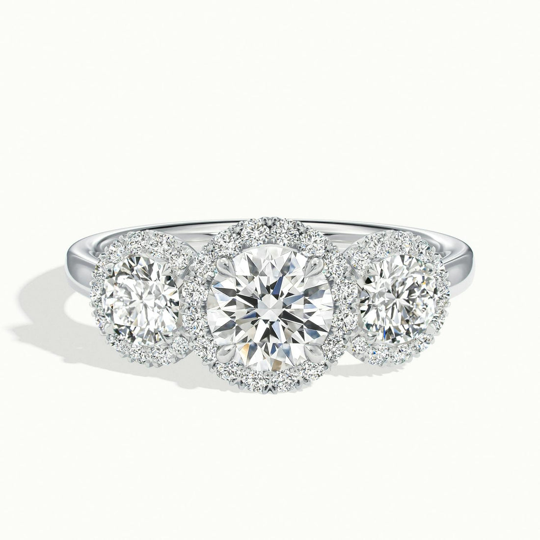 Klaris Round Three Stone Halo Engagement Ring