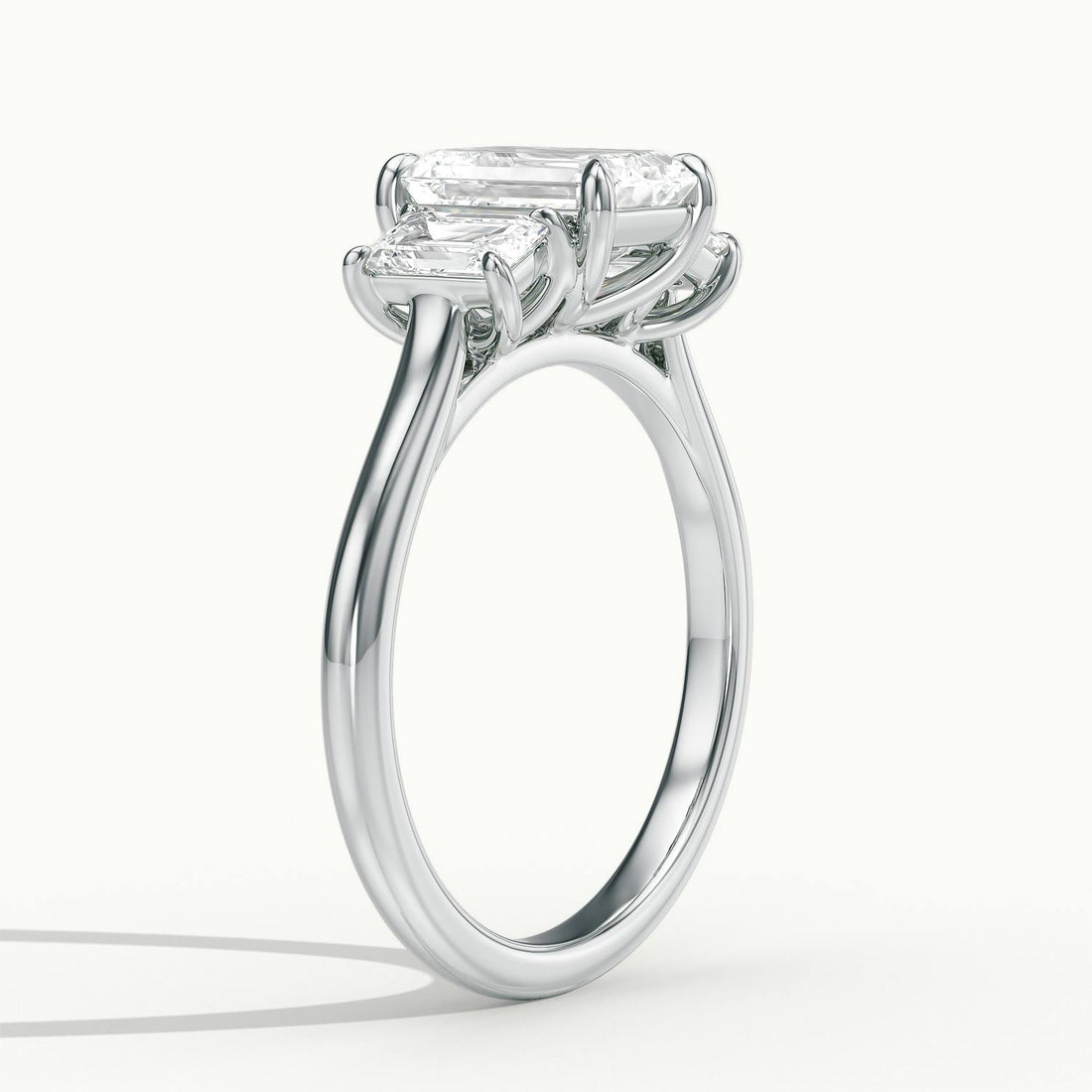 Venetia Emerald Three Stone Diamond Engagement Ring