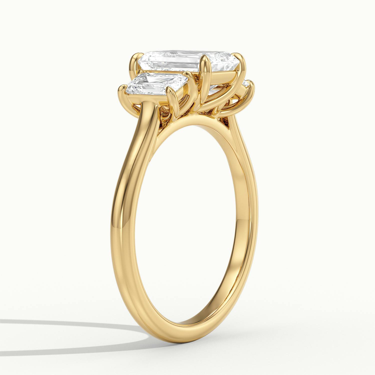 Venetia Emerald Three Stone Diamond Engagement Ring