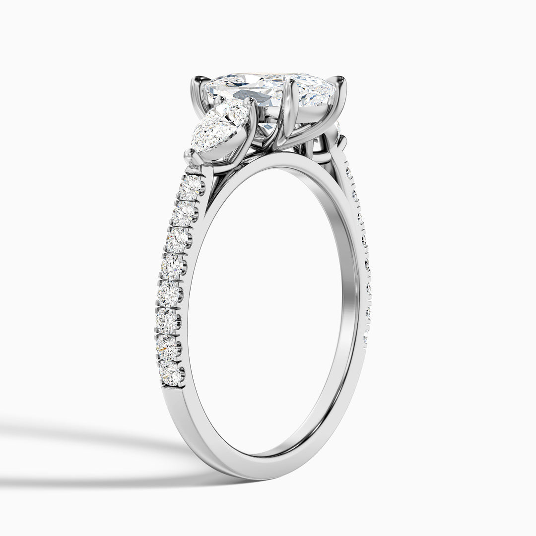 Noorie Three Stone Pave Ring with Pear Side Stones and an Elongated Cushion Lab Grown Diamond
