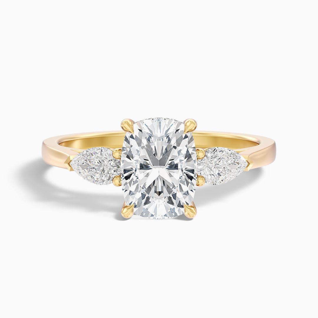 Jarl Three Stone Ring with Pear Side Stones and an Elongated Cushion Lab Grown Diamond