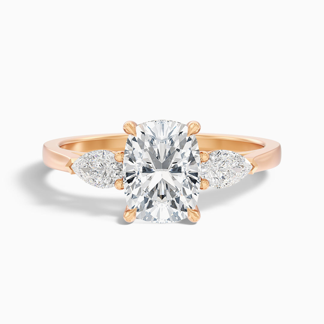 Jarl Three Stone Ring with Pear Side Stones and an Elongated Cushion Lab Grown Diamond