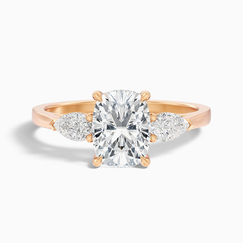 Jarl Three Stone Ring with Pear Side Stones and an Elongated Cushion Lab Grown Diamond