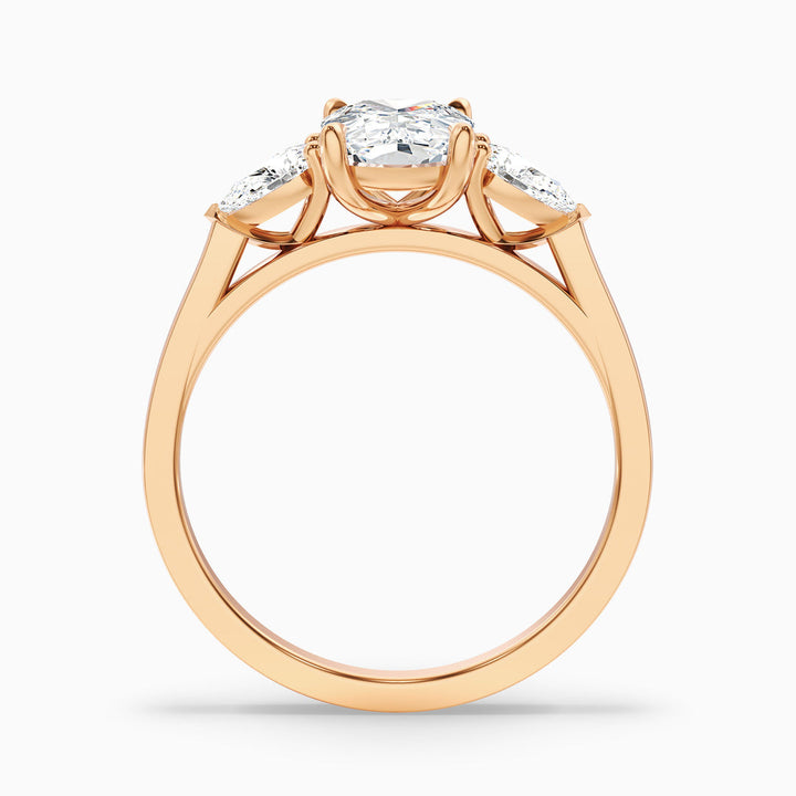 Jarl Three Stone Ring with Pear Side Stones and an Elongated Cushion Lab Grown Diamond