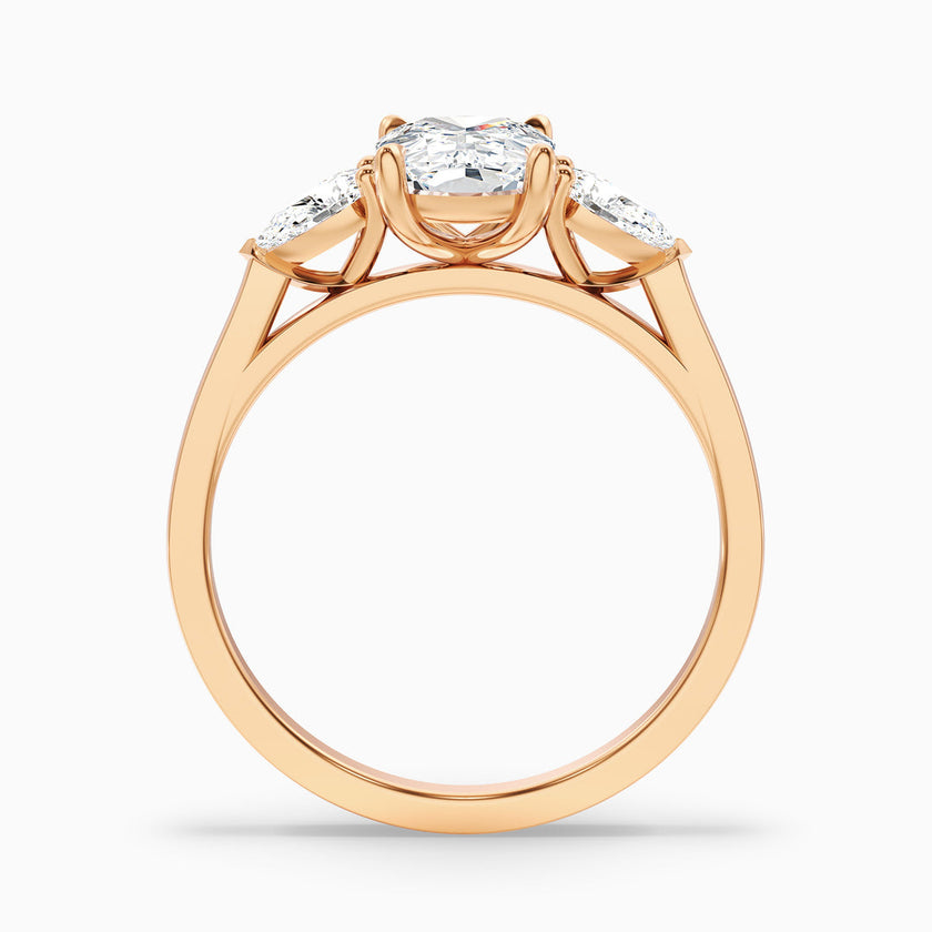 Jarl Three Stone Ring with Pear Side Stones and an Elongated Cushion Lab Grown Diamond