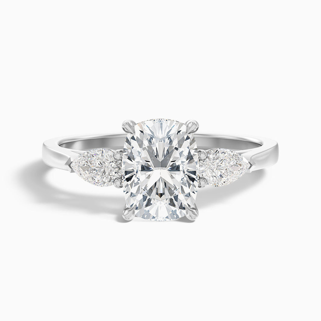 Jarl Three Stone Ring with Pear Side Stones and an Elongated Cushion Lab Grown Diamond