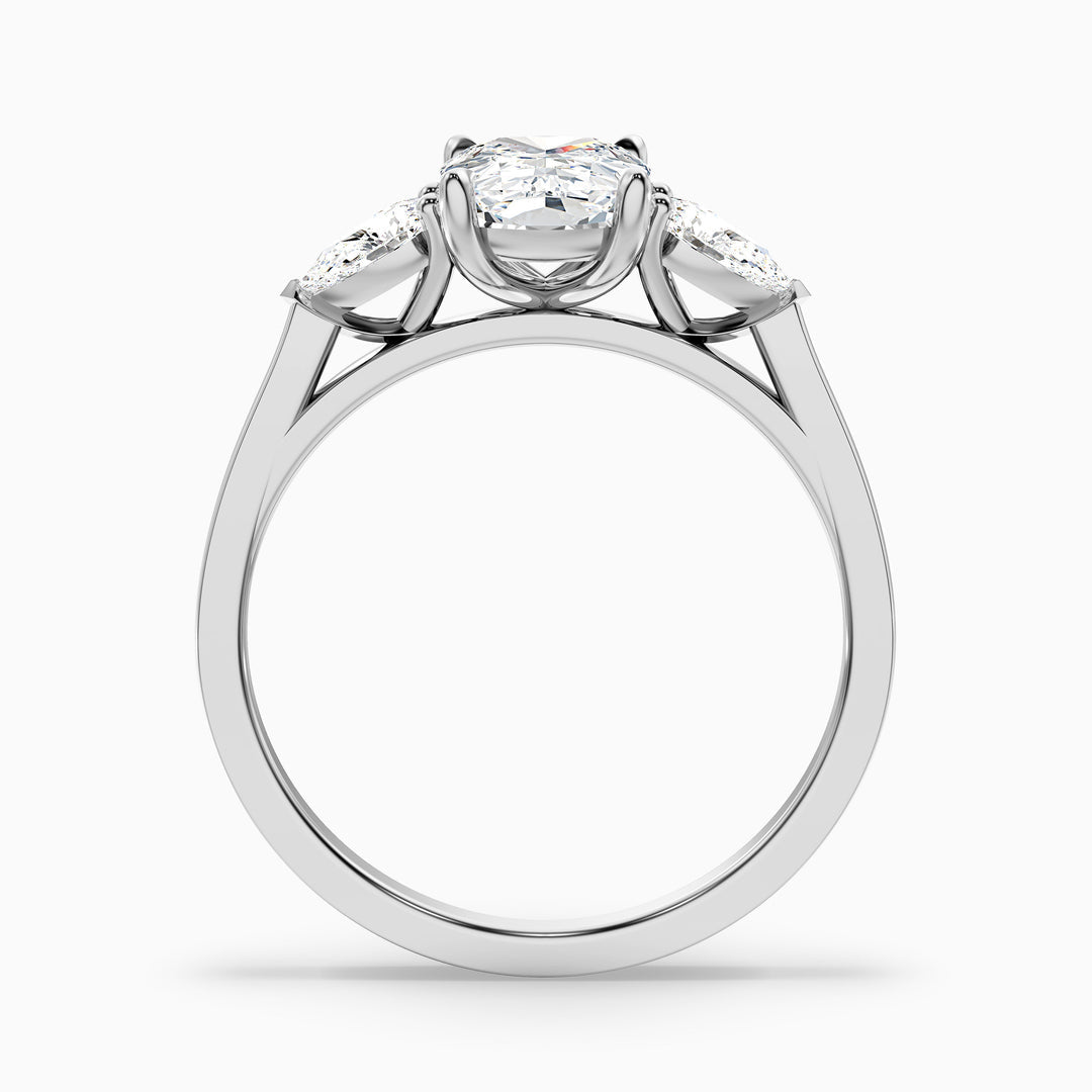 Jarl Three Stone Ring with Pear Side Stones and an Elongated Cushion Lab Grown Diamond