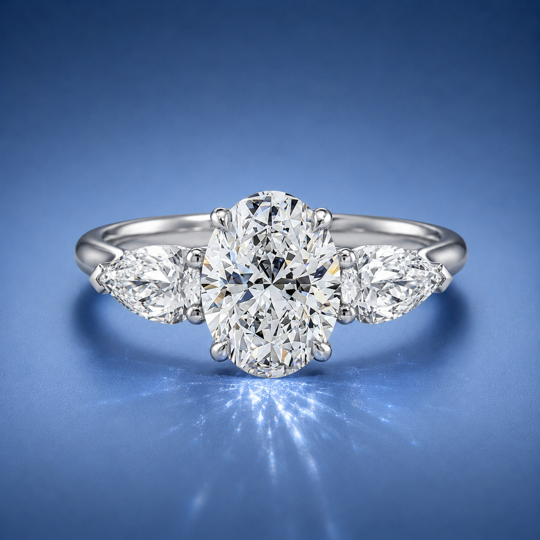 Veyrra Oval Pear Side Stone Engagement Ring