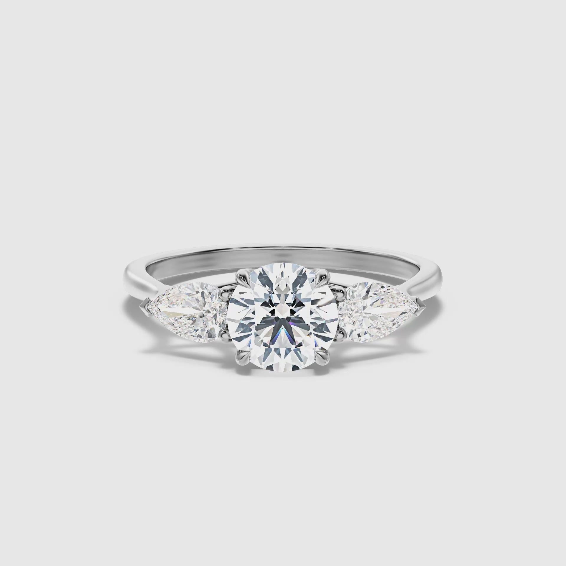 Zina Round 3 Stone Lab Grown Engagement Ring With Pear Side Stone