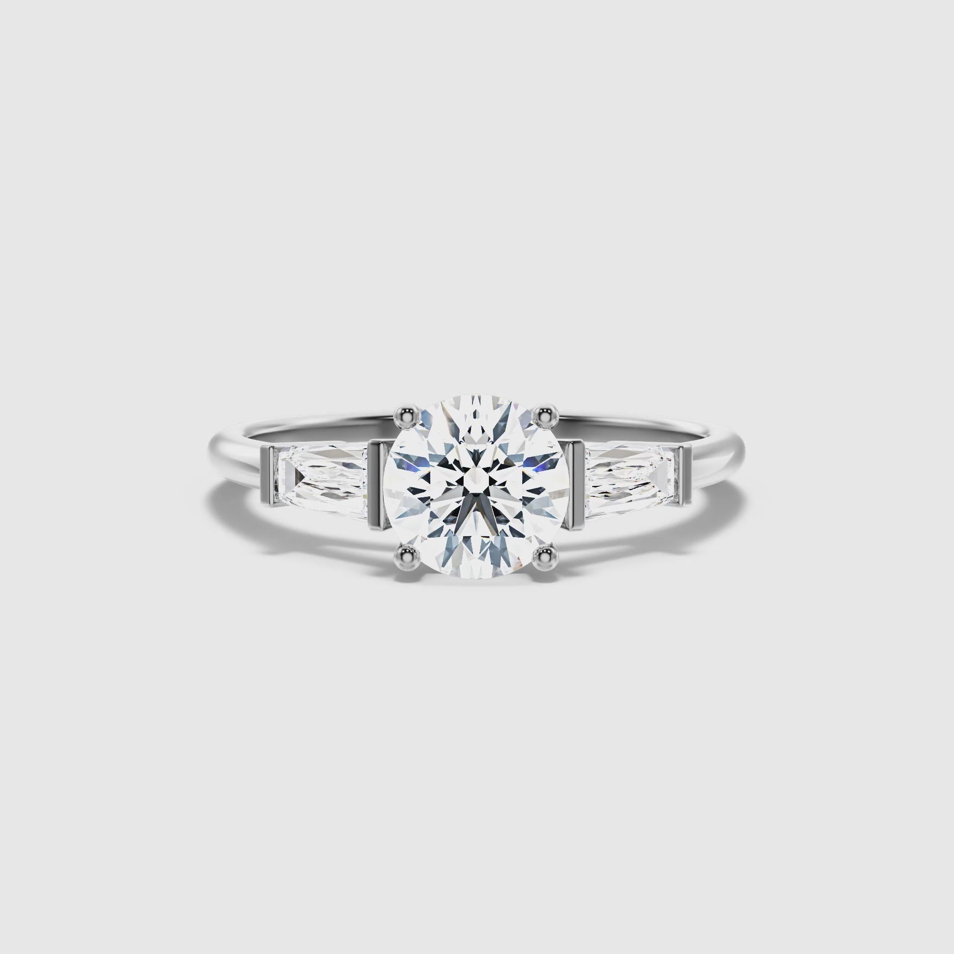 Aire Round 3 Stone Lab Grown Engagement Ring With Side Baguette Diamonds